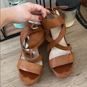 Tan open toed wedges. Size 8